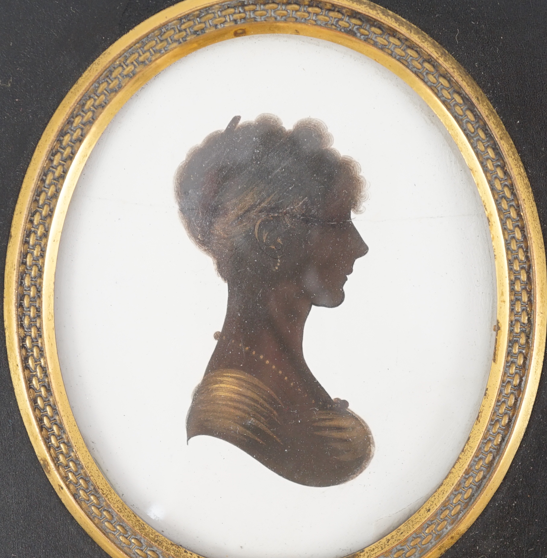 John Miers (1756-1821), Silhouettes of young ladies, painted and bronzed plaster (2), 8 x 6.5cm.